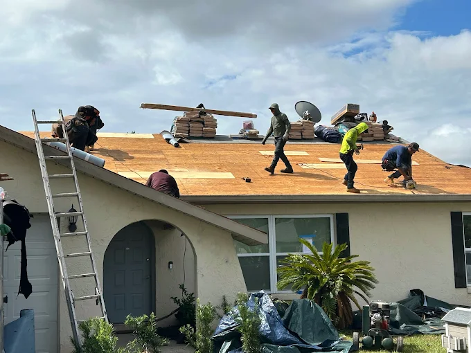 Suntec Roofing crew completing a residential roof installation in Kissimmee, Florida