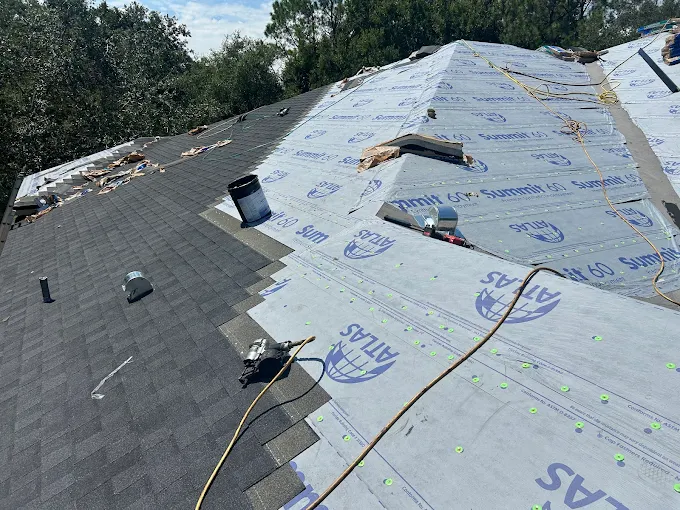 Suntec Roofing crew performing a roof inspection on a Kissimmee home