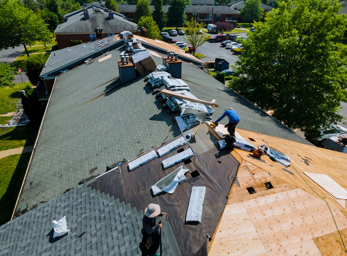 Storm damage to a residential roof requiring emergency repair in Kissimmee