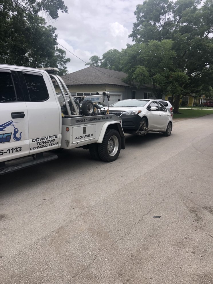 Car being towed safely in Richmond TX by Twin Cities Towing